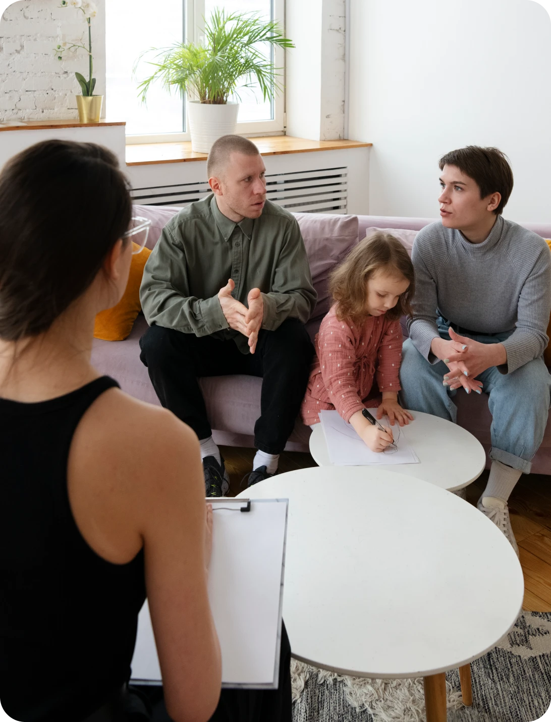 Family meeting with counselor discussing divorce and custody guidance.