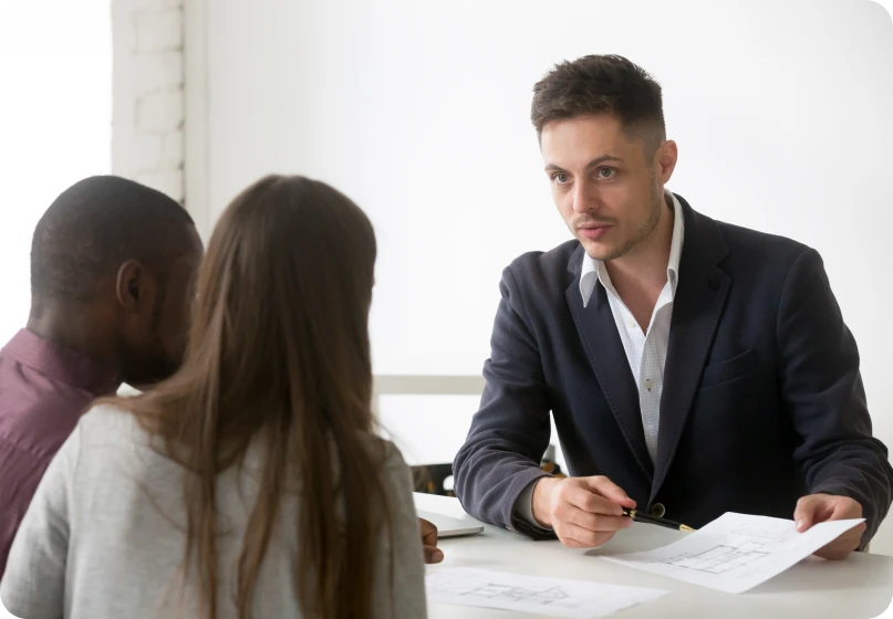 Family lawyer explaining relocation laws and parenting responsibilities to a client.