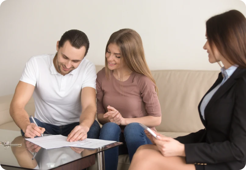 Clients meeting a lawyer to discuss enforcement actions for family law agreements.