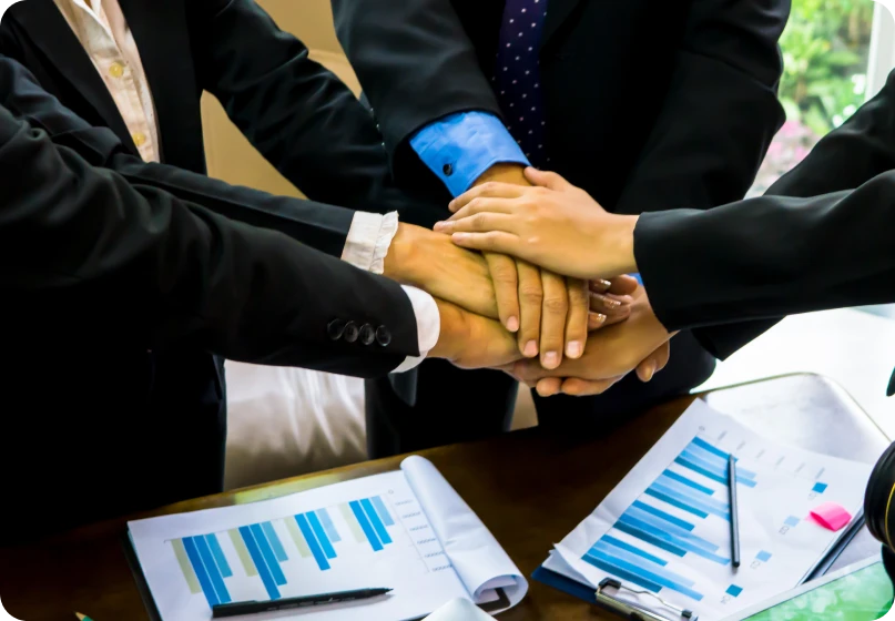 Legal professional discussing joint venture agreements and trust claims with clients.