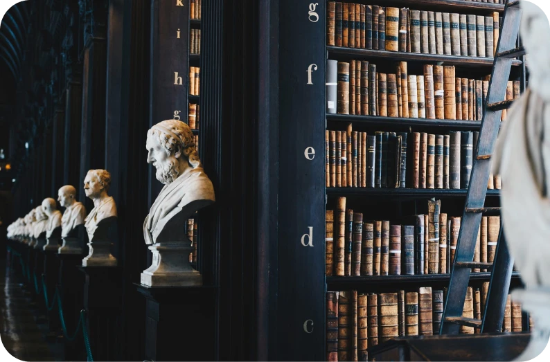 Row of judicial statues in library symbolizing authority behind enforcement of orders.