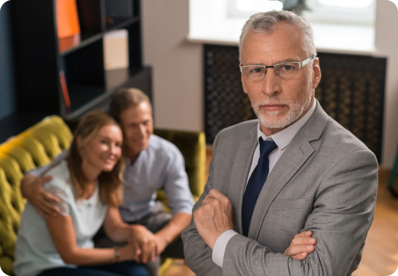 Couple meeting with lawyer for collaborative family law and divorce planning.