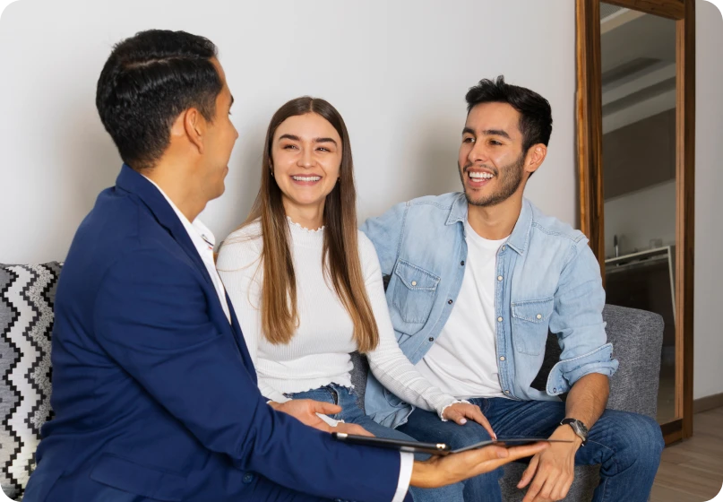 Couple discussing collaborative family law options with lawyer.